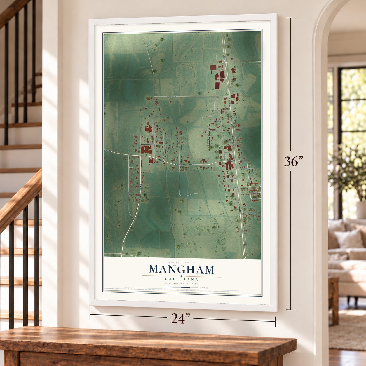 Mangham, Louisiana map, 24 x 36 inch print in a white frame by a staircase