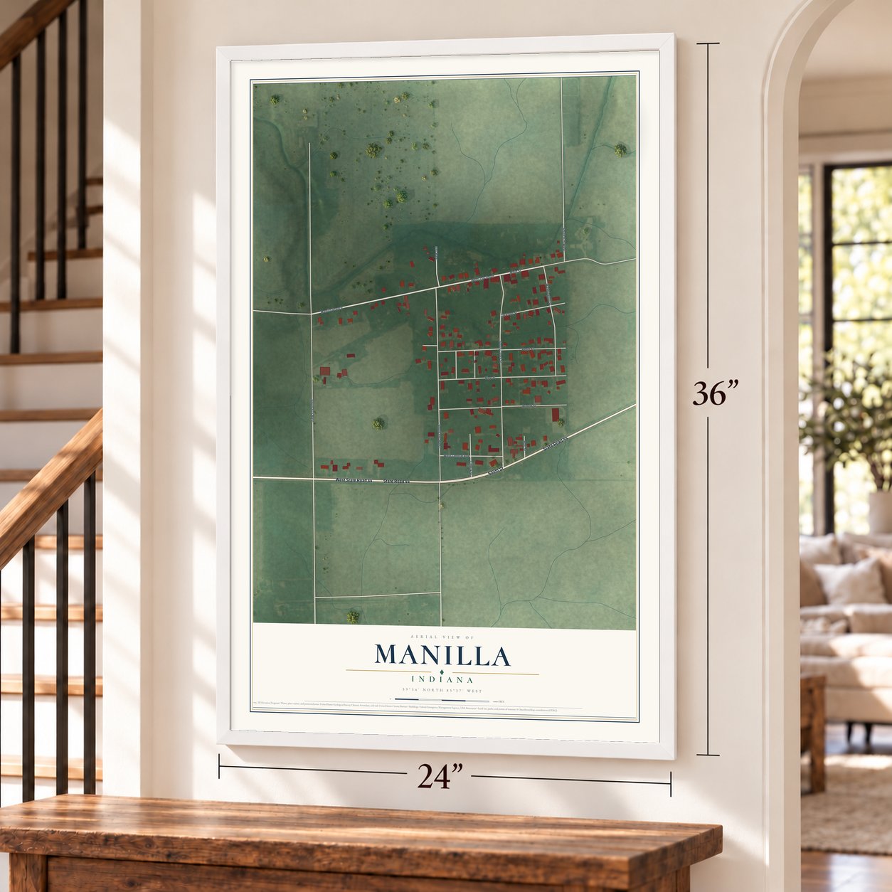 Manilla, Indiana map, 24 x 36 inch print in a white frame by a staircase