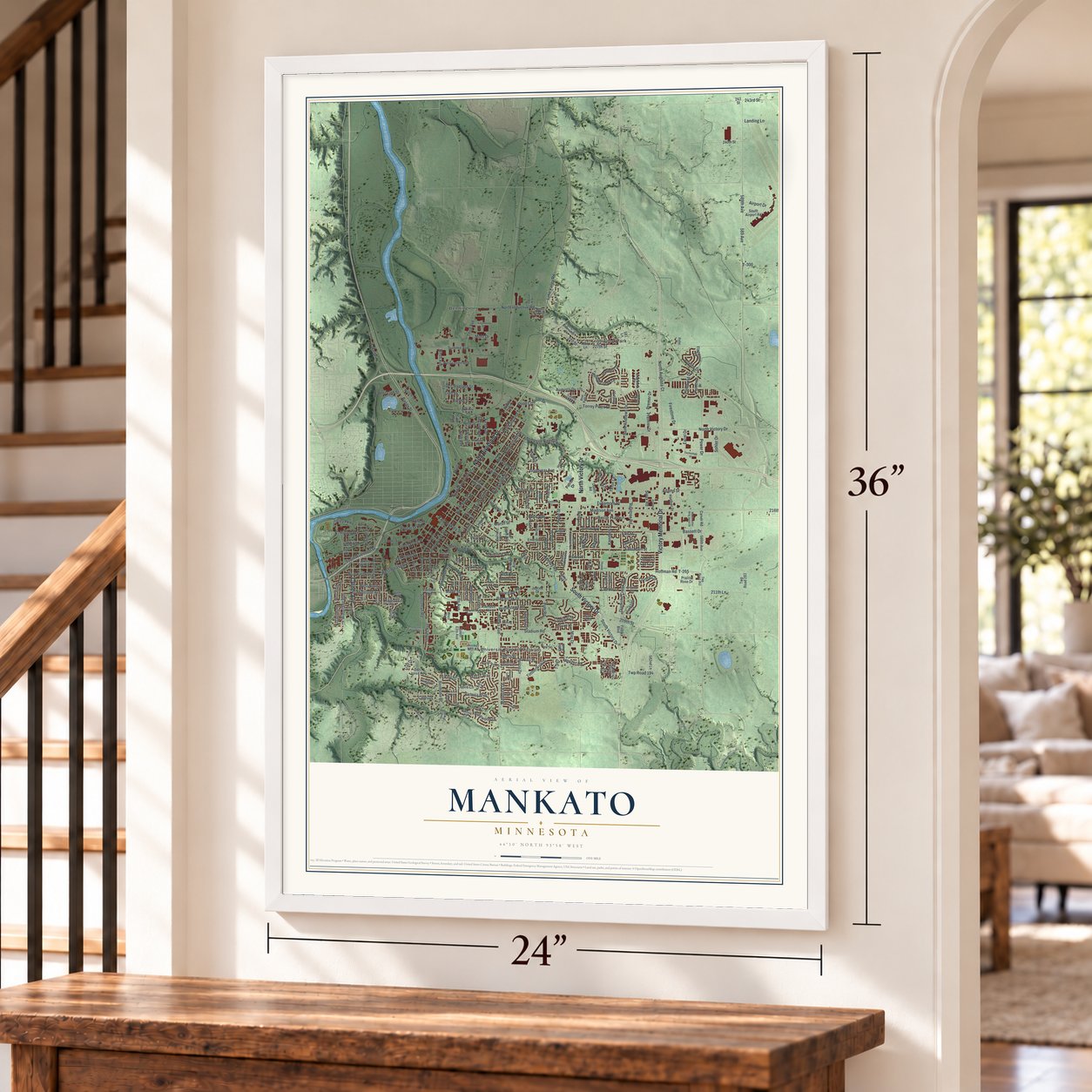 Mankato, Minnesota map, 24 x 36 inch print in a white frame by a staircase