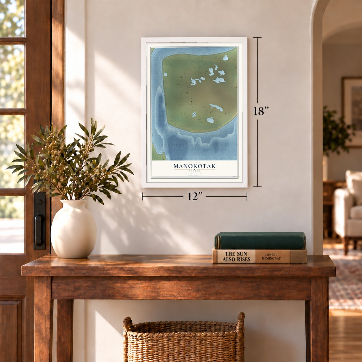 Manokotak, Alaska map, 12 x 18 inch print in a white frame in an entryway