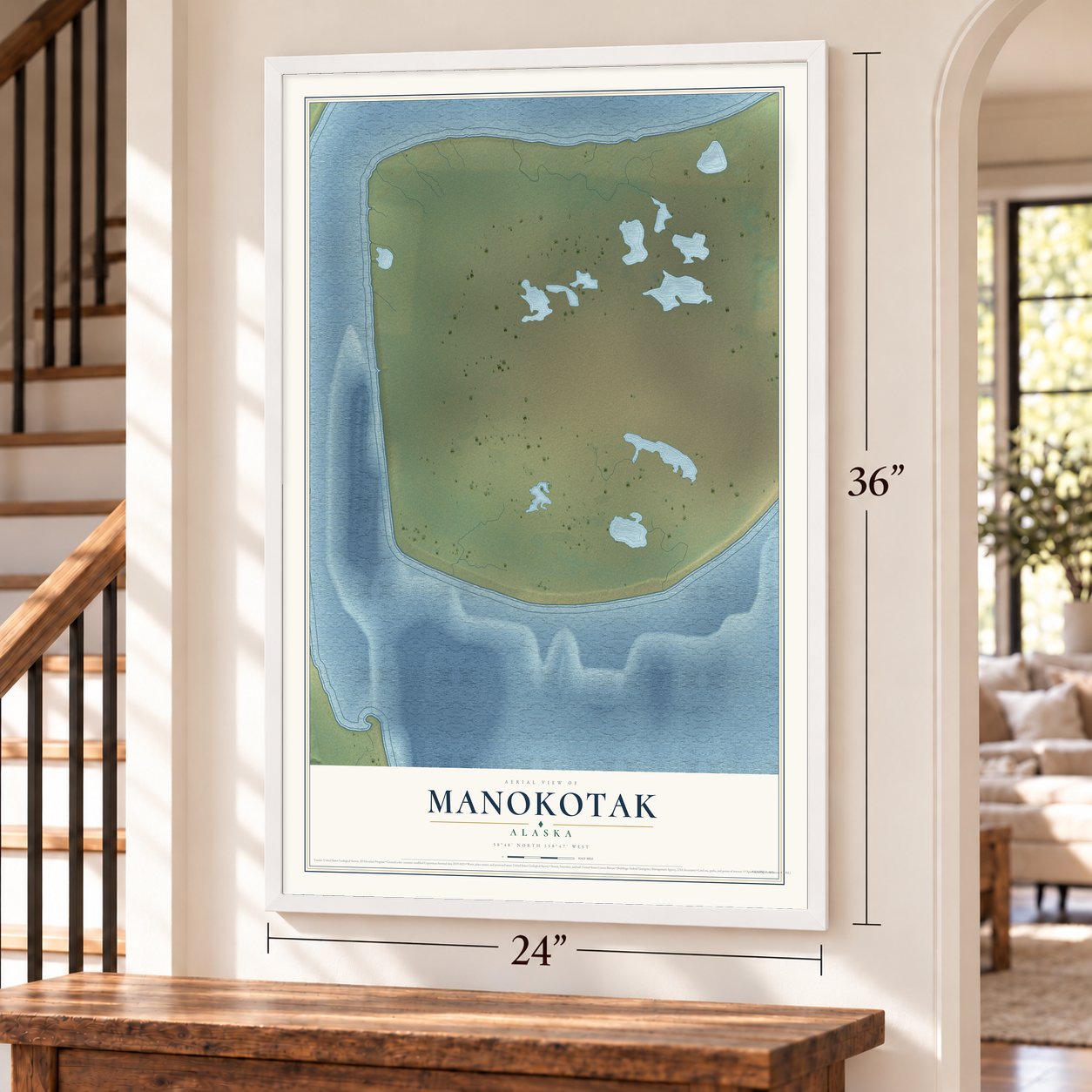 Manokotak, Alaska map, 24 x 36 inch print in a white frame by a staircase