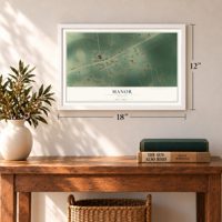 Manor, Georgia map, 12 x 18 inch print in a white frame in an entryway