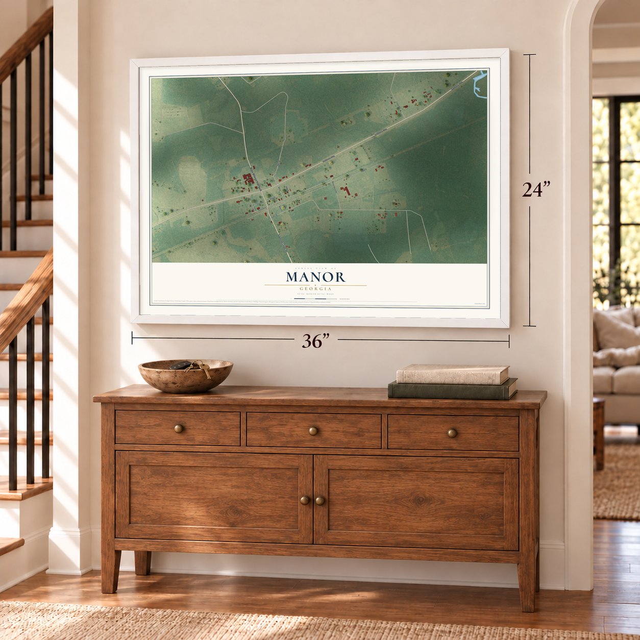 Manor, Georgia map, 24 x 36 inch print in a white frame above a dresser by a staircase