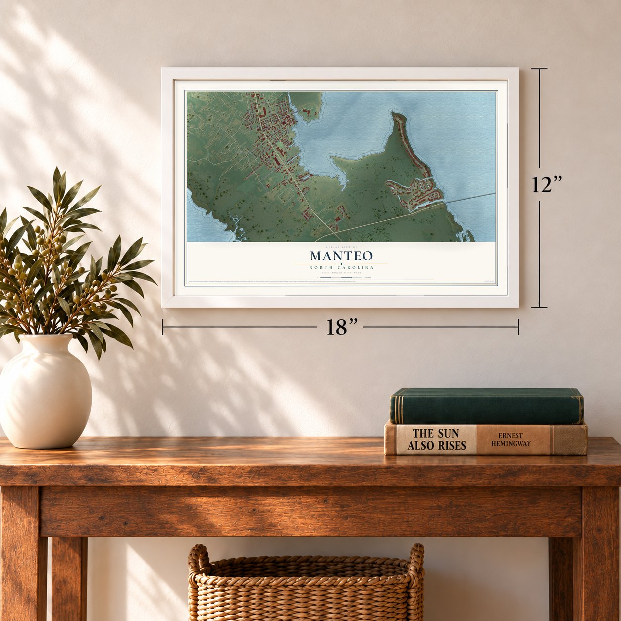 Manteo, North Carolina map, 12 x 18 inch print in a white frame in an entryway