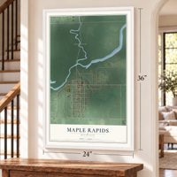 Maple Rapids, Michigan map, 24 x 36 inch print in a white frame by a staircase