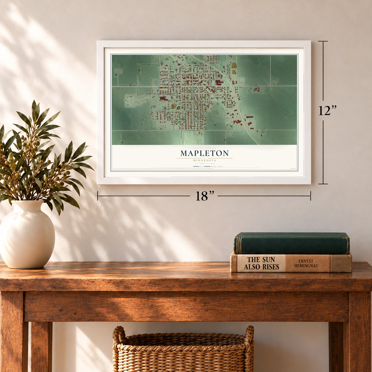Mapleton, Minnesota map, 12 x 18 inch print in a white frame in an entryway
