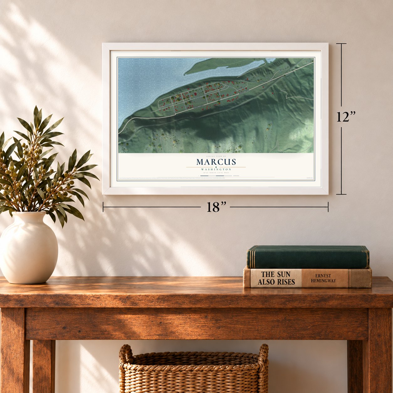 Marcus, Washington map, 12 x 18 inch print in a white frame in an entryway