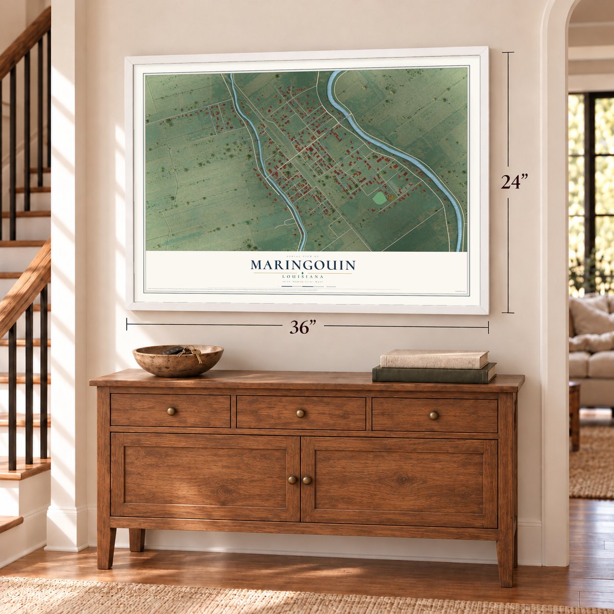 Maringouin, Louisiana map, 24 x 36 inch print in a white frame above a dresser by a staircase