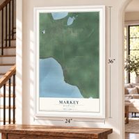 Markey, Michigan map, 24 x 36 inch print in a white frame by a staircase