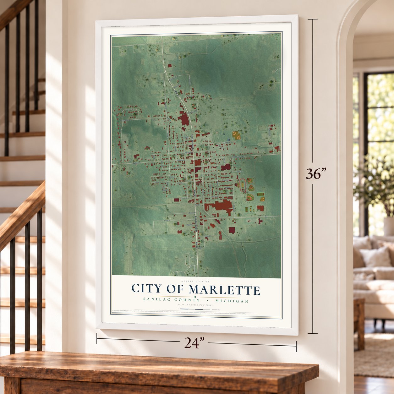 Marlette, Michigan map, 24 x 36 inch print in a white frame by a staircase