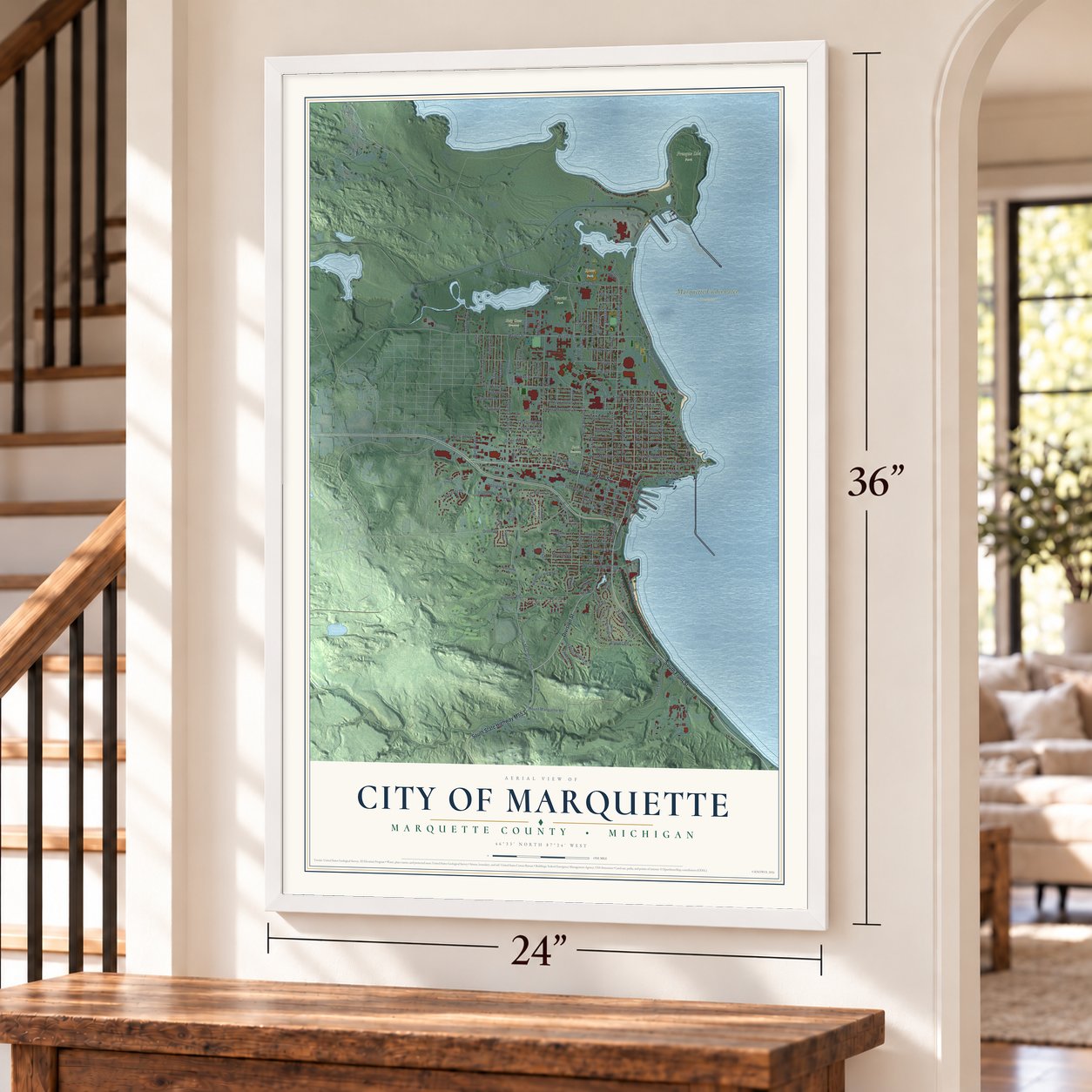 Marquette, Michigan map, 24 x 36 inch print in a white frame by a staircase