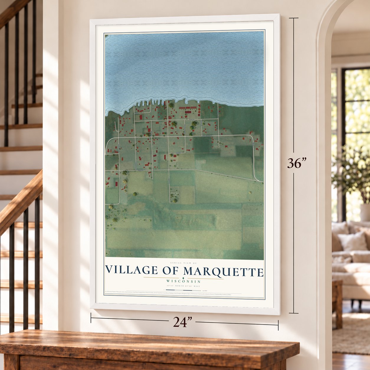 Marquette, Wisconsin map, 24 x 36 inch print in a white frame by a staircase