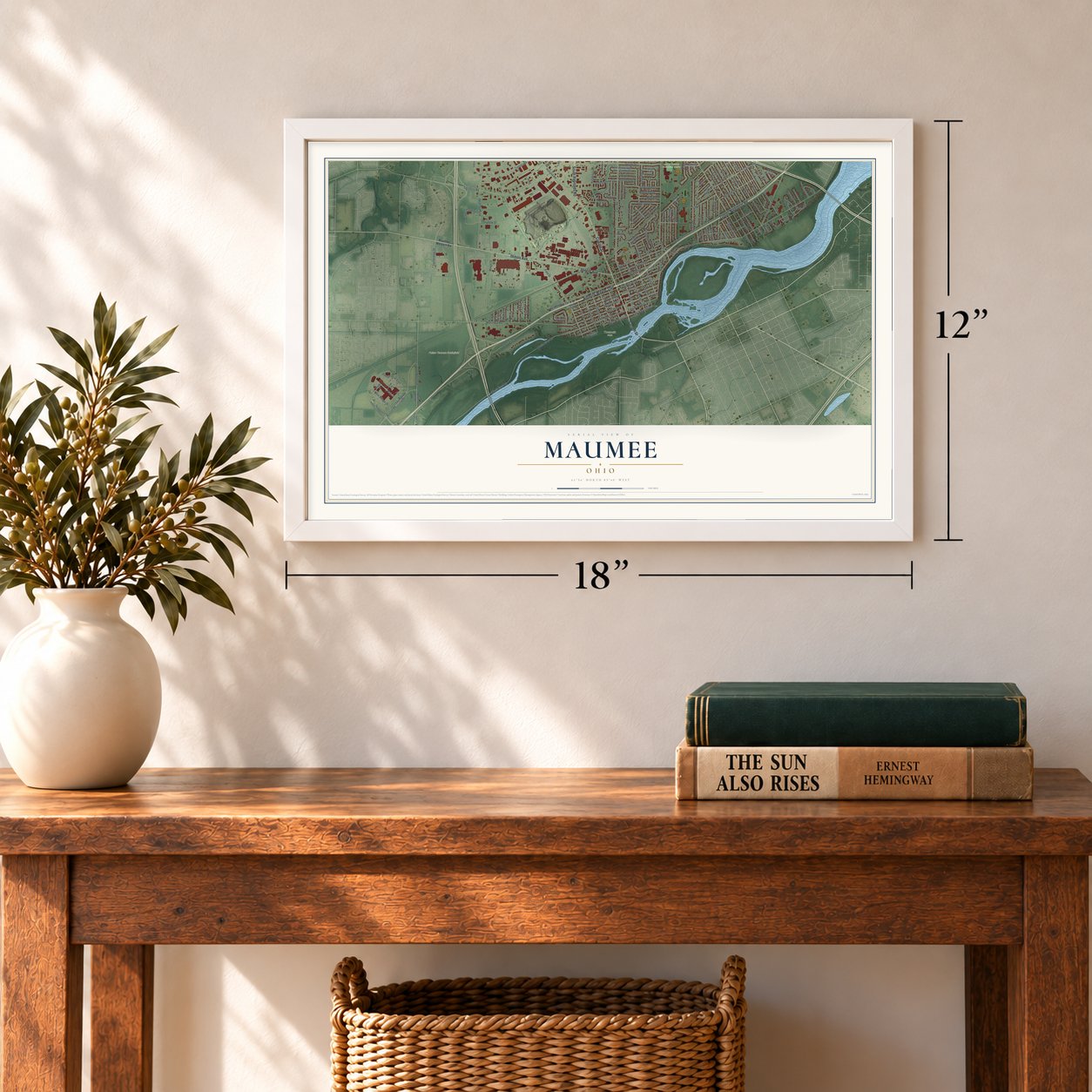 Maumee, Ohio map, 12 x 18 inch print in a white frame in an entryway