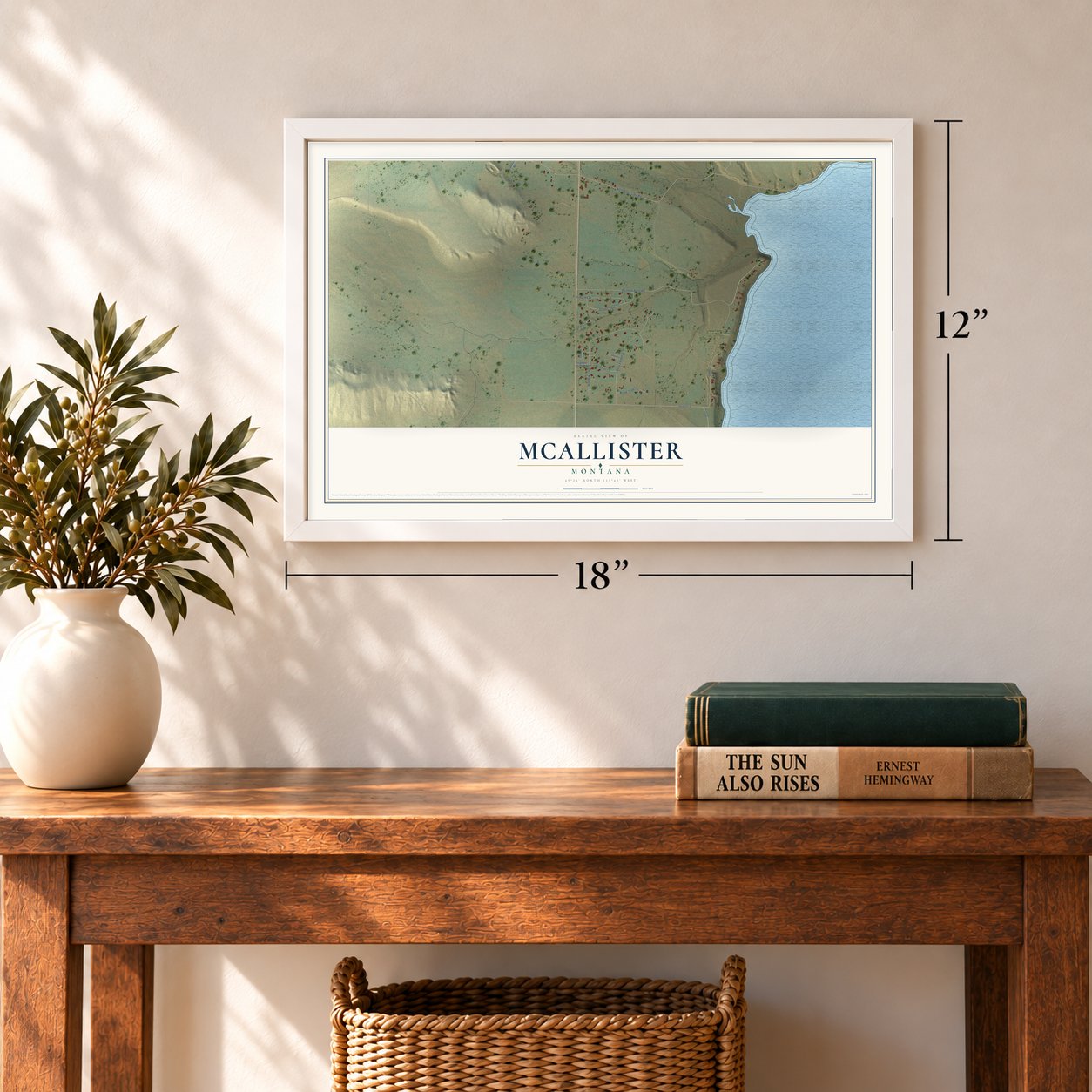 McAllister, Montana map, 12 x 18 inch print in a white frame in an entryway