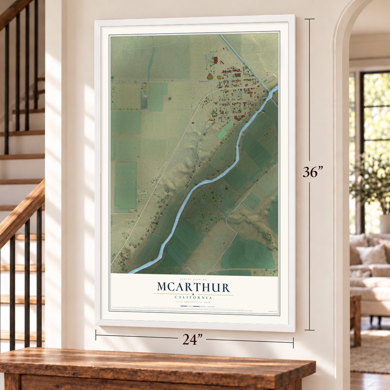 McArthur, California map, 24 x 36 inch print in a white frame by a staircase