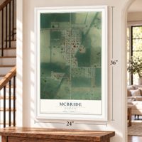 McBride, Michigan map, 24 x 36 inch print in a white frame by a staircase