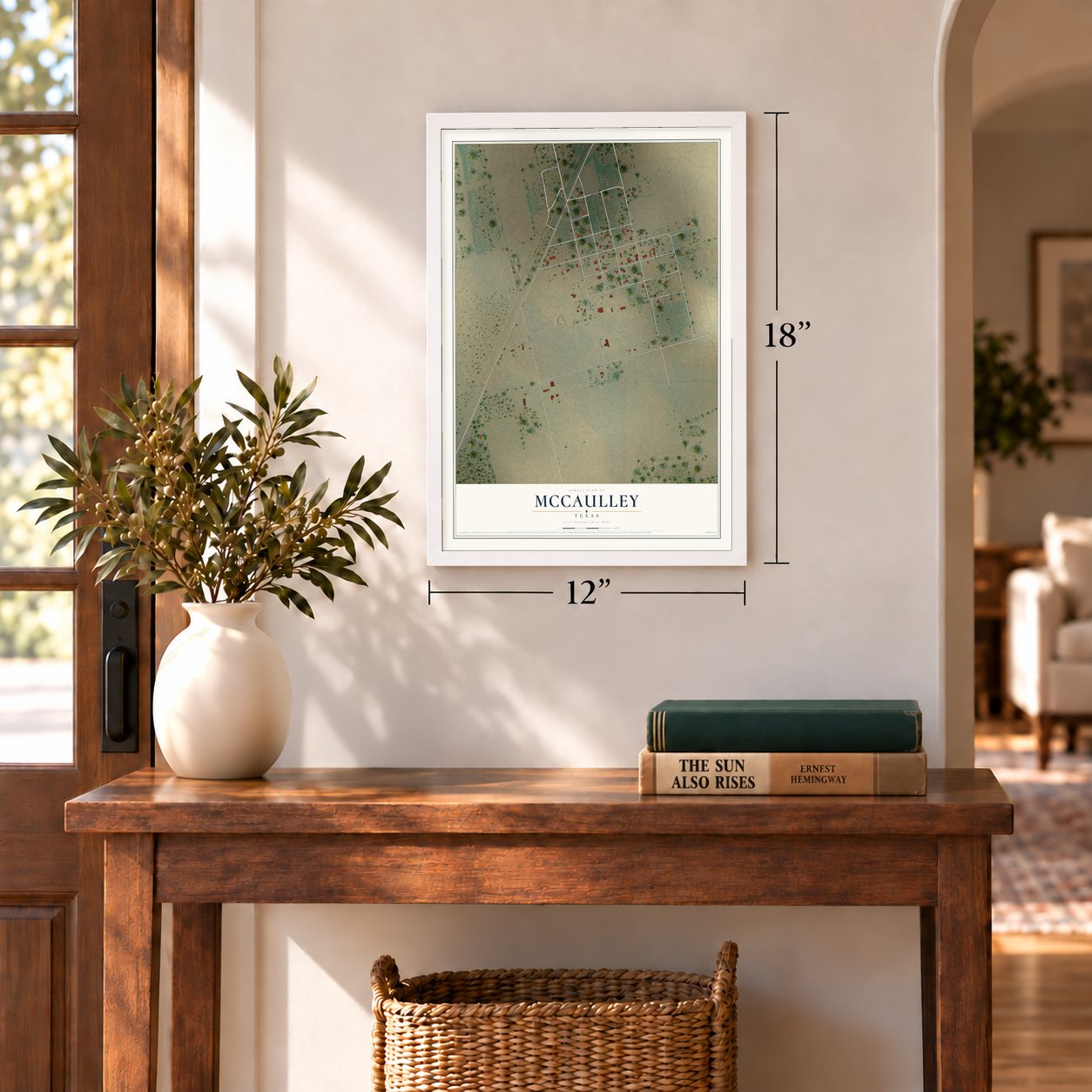 McCaulley, Texas map, 12 x 18 inch print in a white frame in an entryway