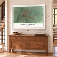 McConnellsburg, Pennsylvania map, 24 x 36 inch print in a white frame above a dresser by a staircase