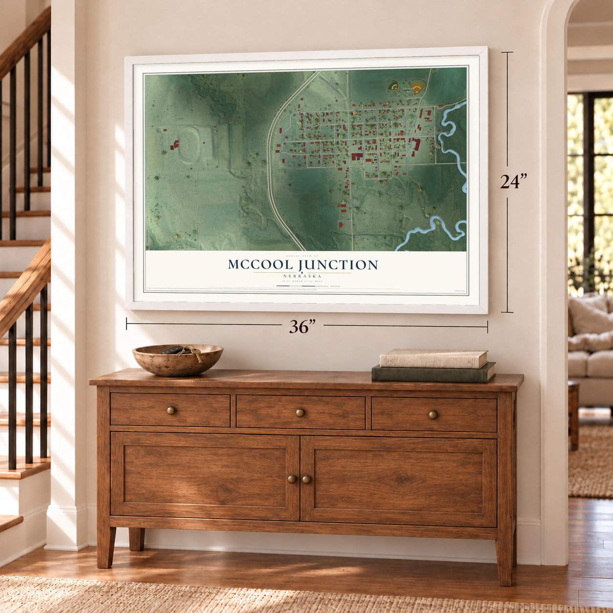 McCool Junction, Nebraska map, 24 x 36 inch print in a white frame above a dresser by a staircase