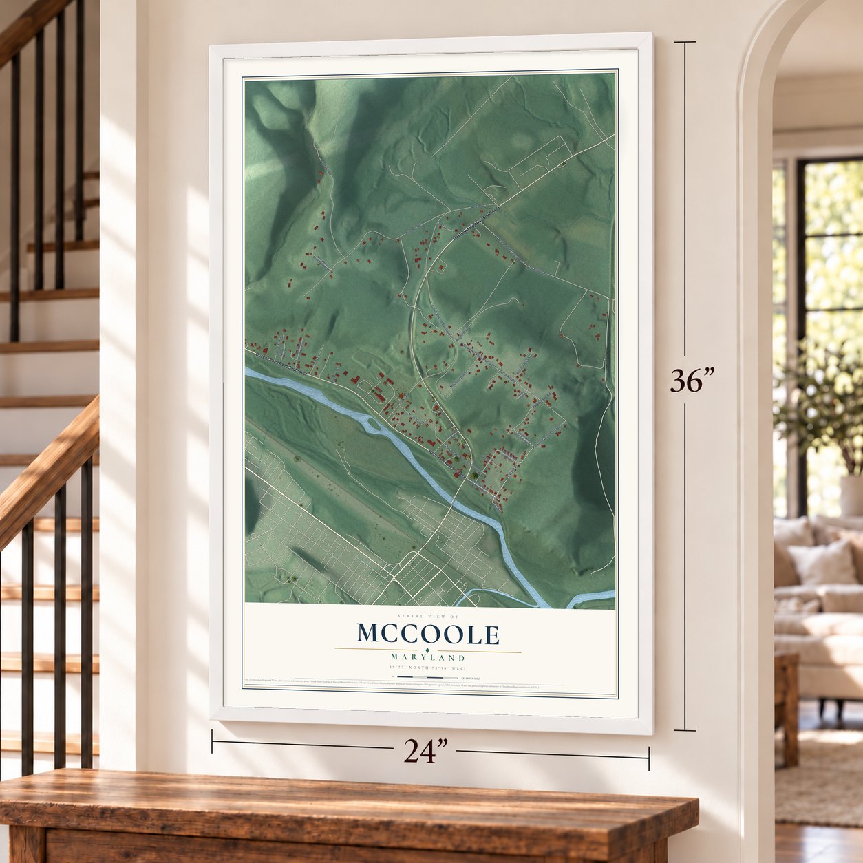McCoole, Maryland map, 24 x 36 inch print in a white frame by a staircase
