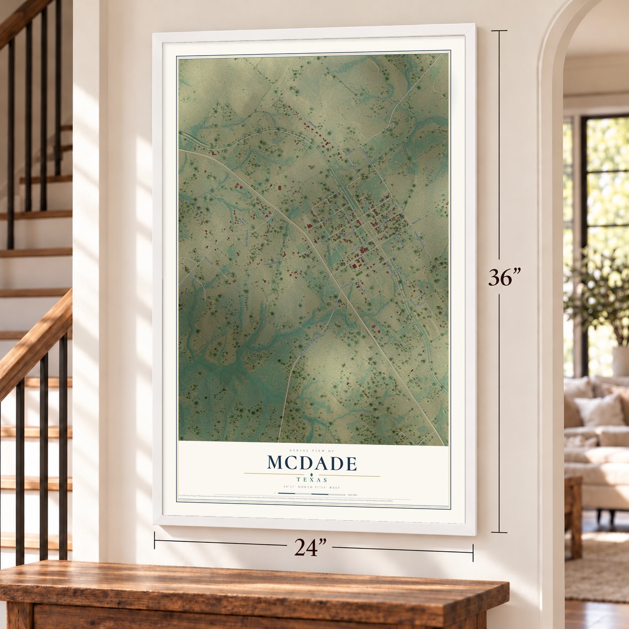 McDade, Texas map, 24 x 36 inch print in a white frame by a staircase