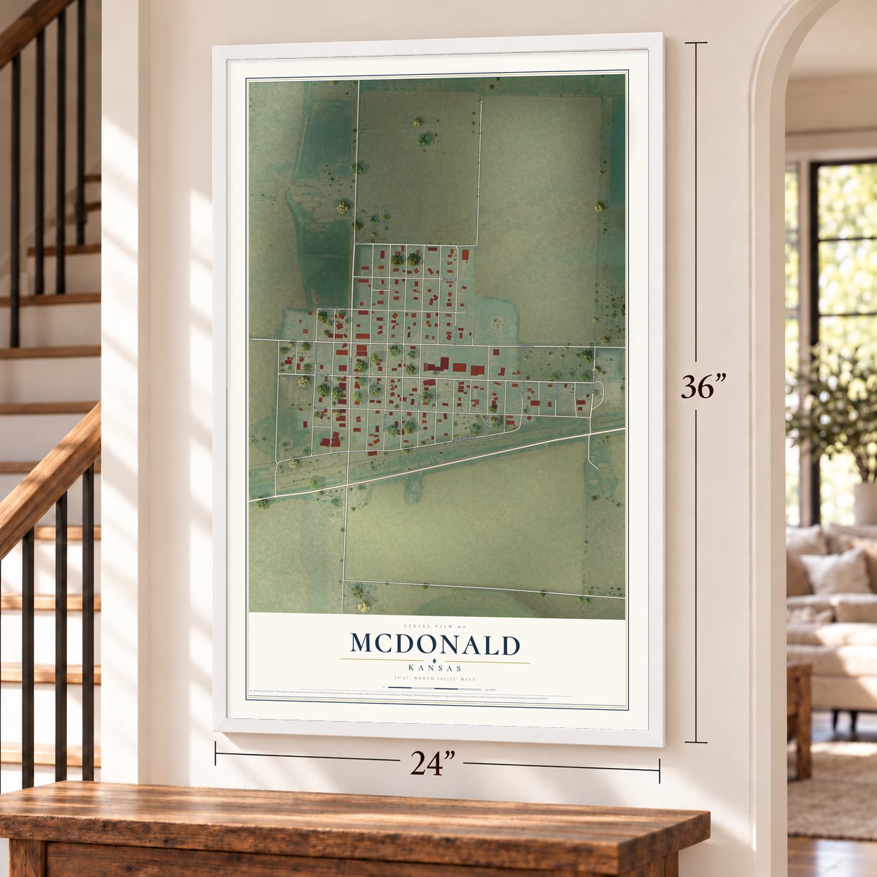 McDonald, Kansas map, 24 x 36 inch print in a white frame by a staircase