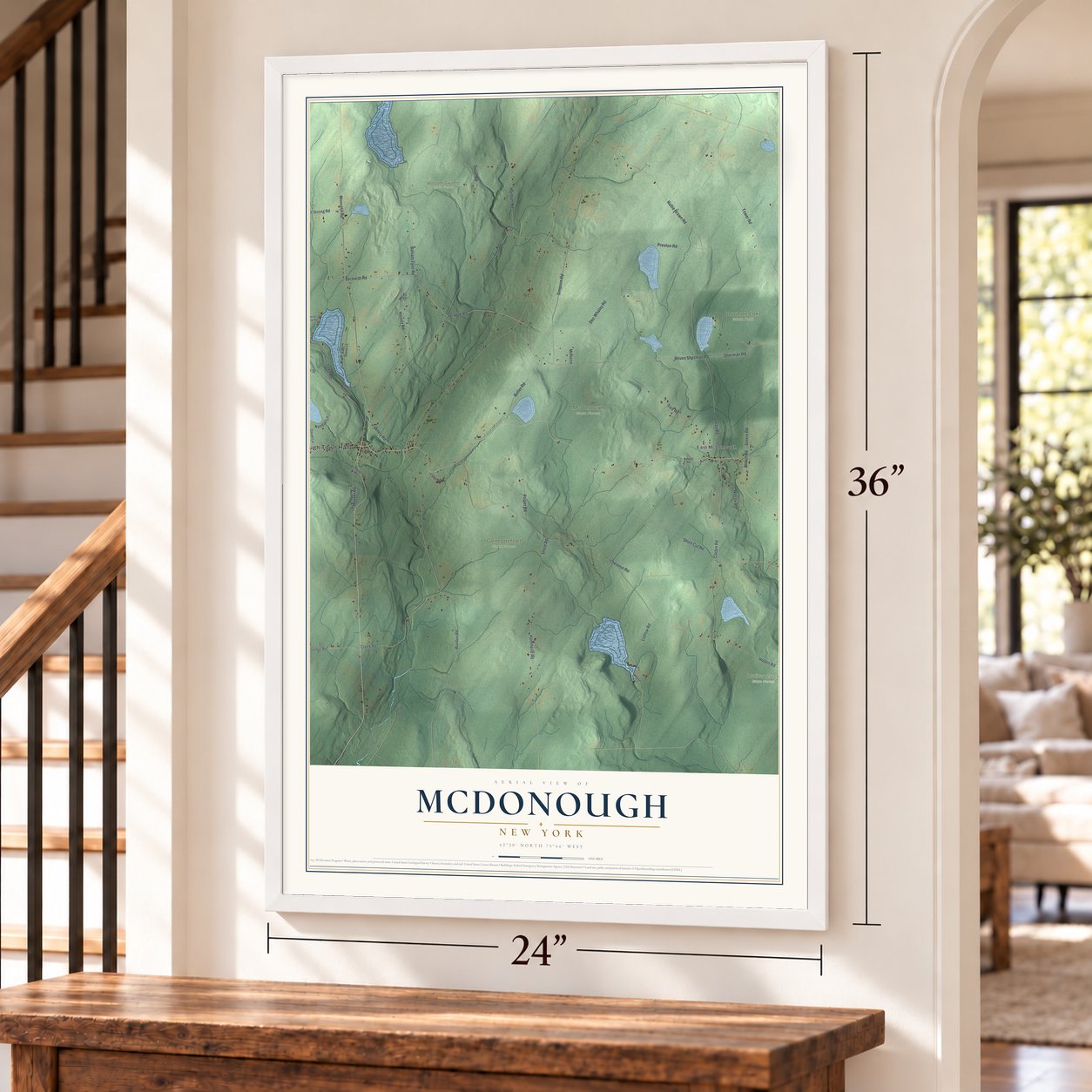 McDonough, New York map, 24 x 36 inch print in a white frame by a staircase