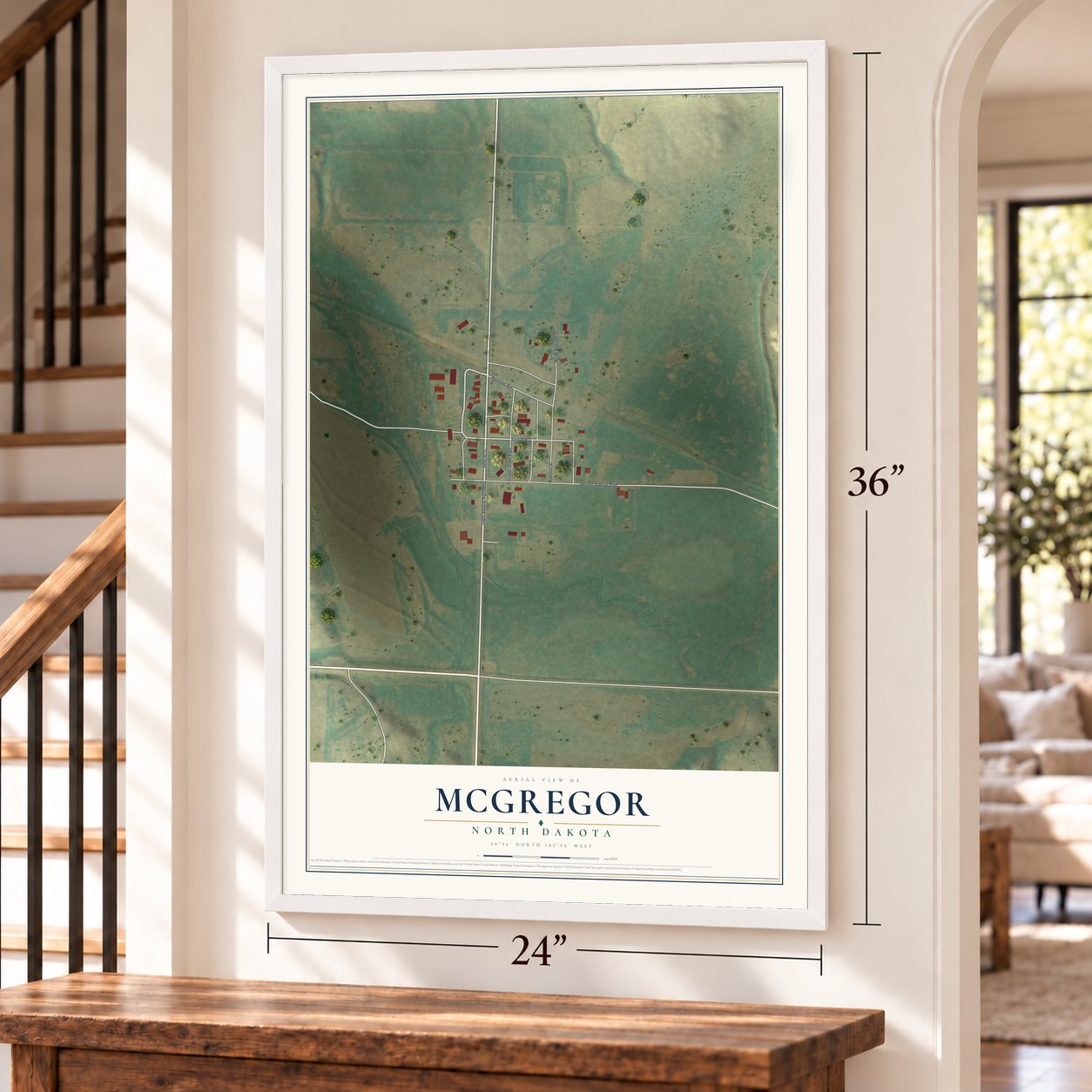McGregor, North Dakota map, 24 x 36 inch print in a white frame by a staircase