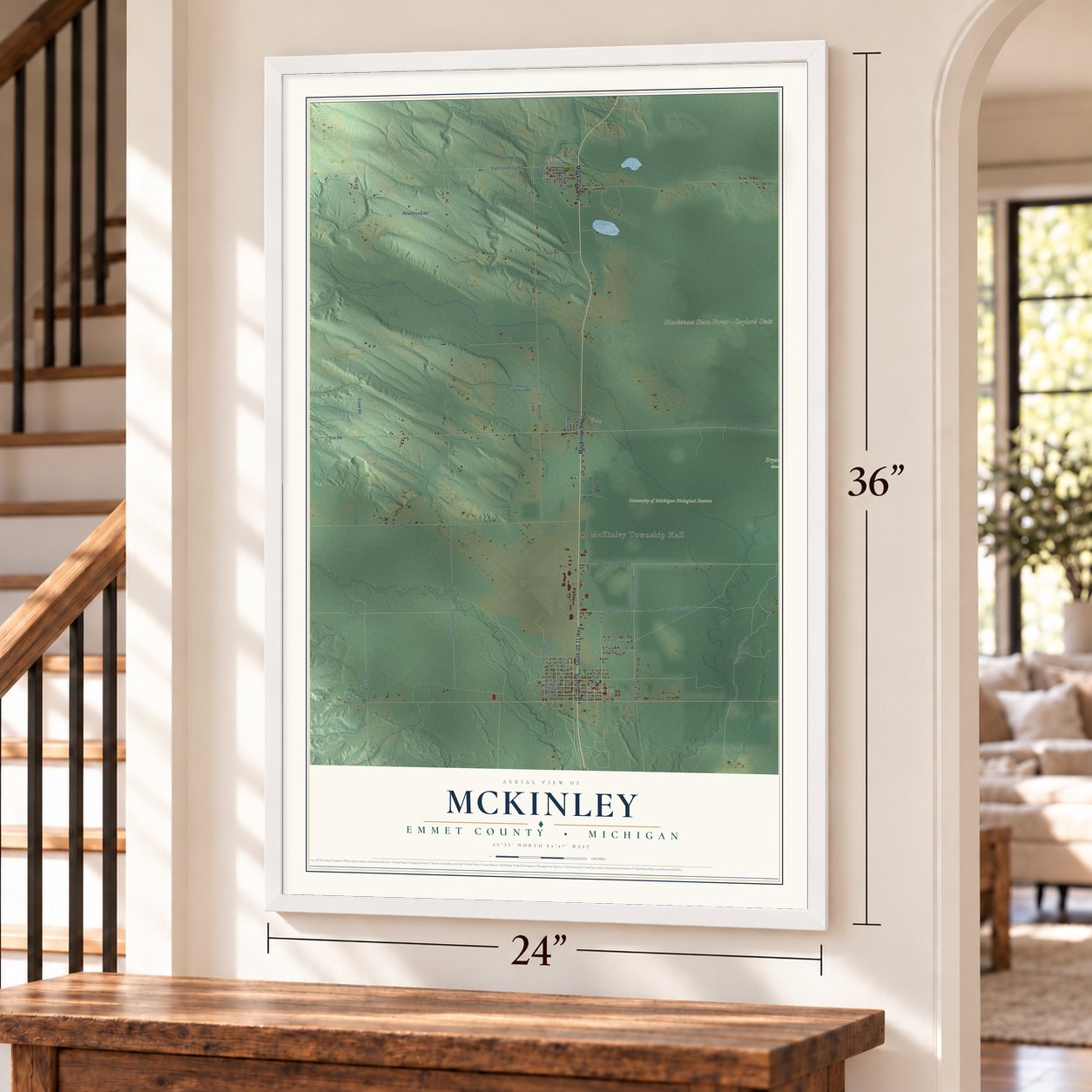 McKinley, Emmet County, Michigan map, 24 x 36 inch print in a white frame by a staircase
