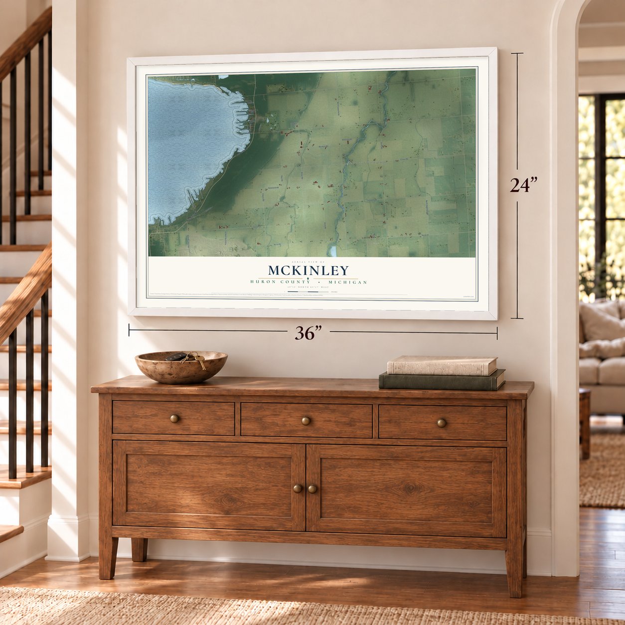McKinley, Huron County, Michigan map, 24 x 36 inch print in a white frame above a dresser by a staircase