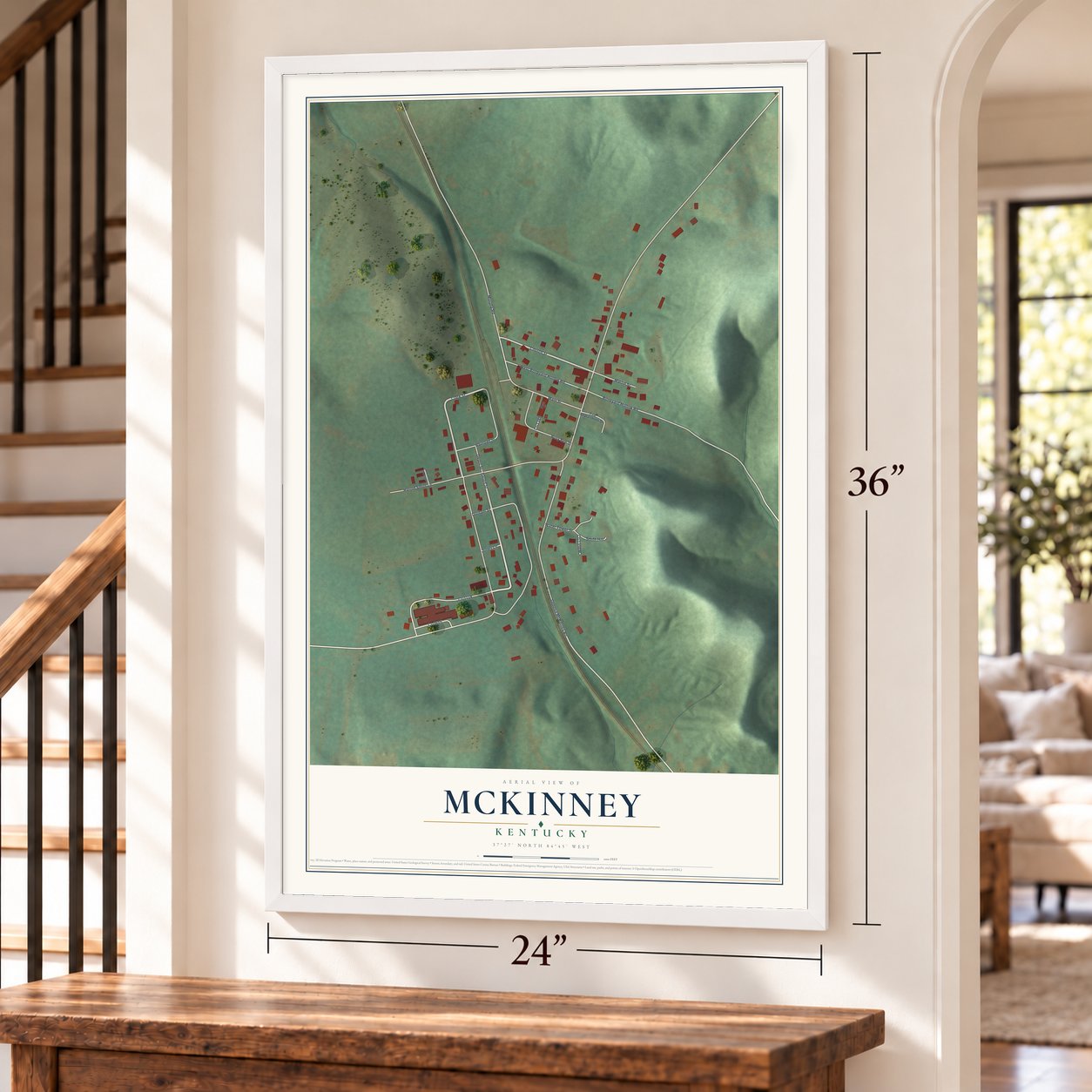 McKinney, Kentucky map, 24 x 36 inch print in a white frame by a staircase