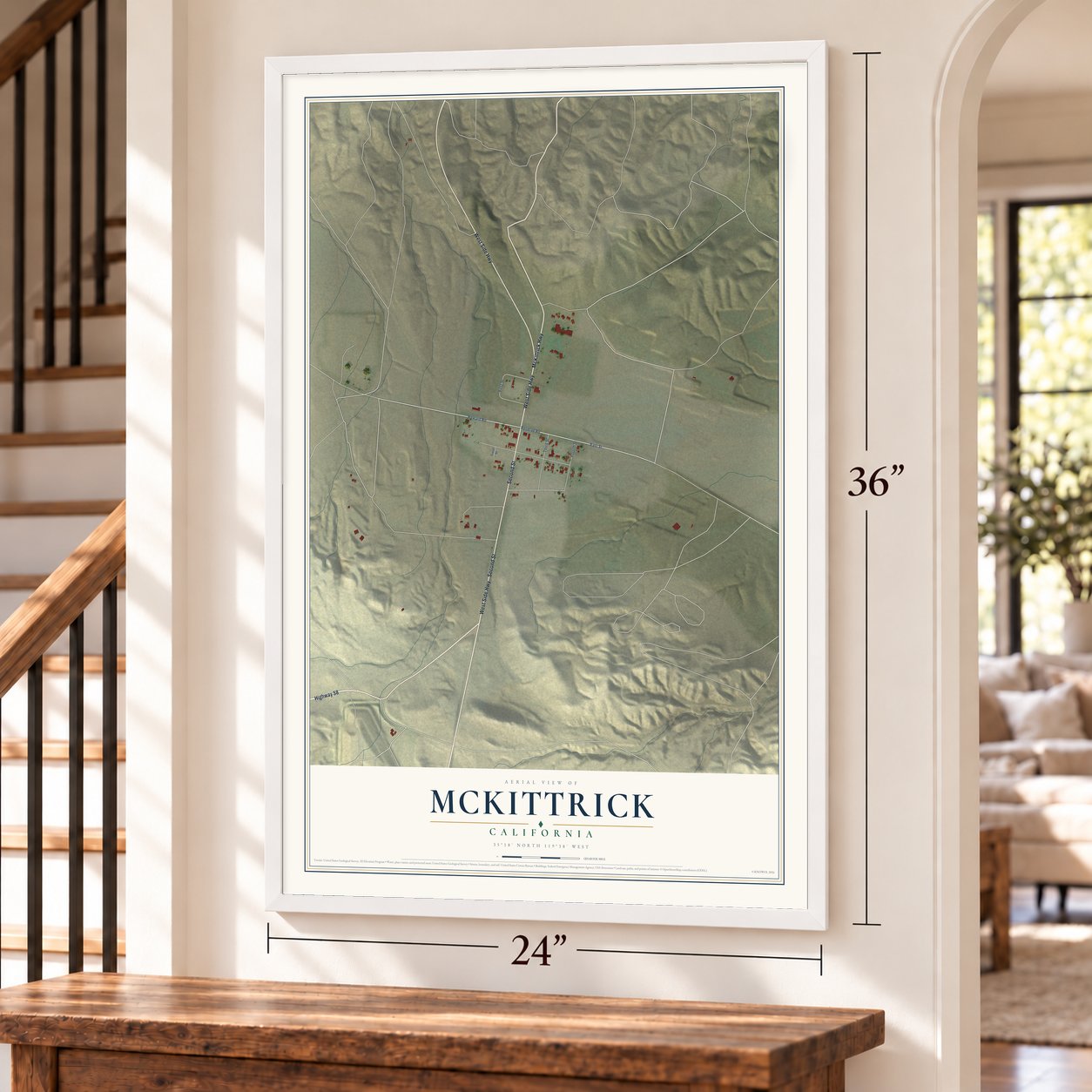 McKittrick, California map, 24 x 36 inch print in a white frame by a staircase