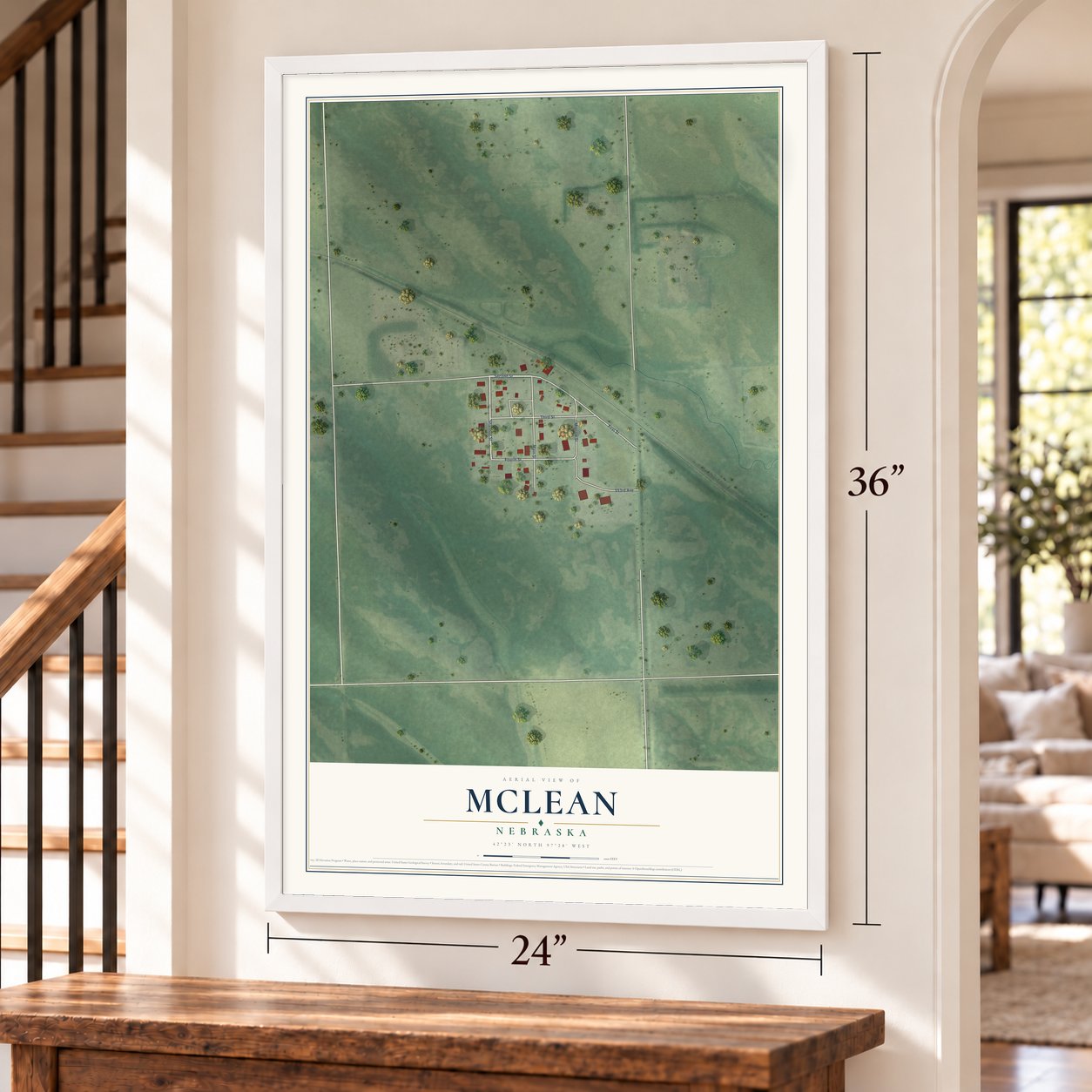 McLean, Nebraska map, 24 x 36 inch print in a white frame by a staircase