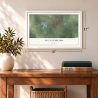 McLeansboro, Illinois map, 12 x 18 inch print in a white frame in an entryway