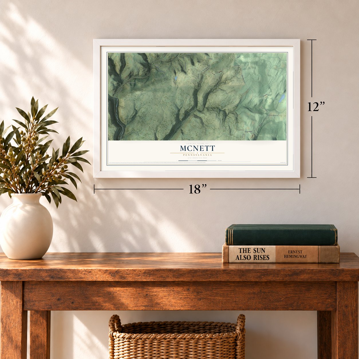 McNett, Pennsylvania map, 12 x 18 inch print in a white frame in an entryway
