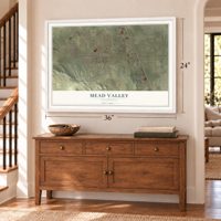 Mead Valley, California map, 24 x 36 inch print in a white frame above a dresser by a staircase