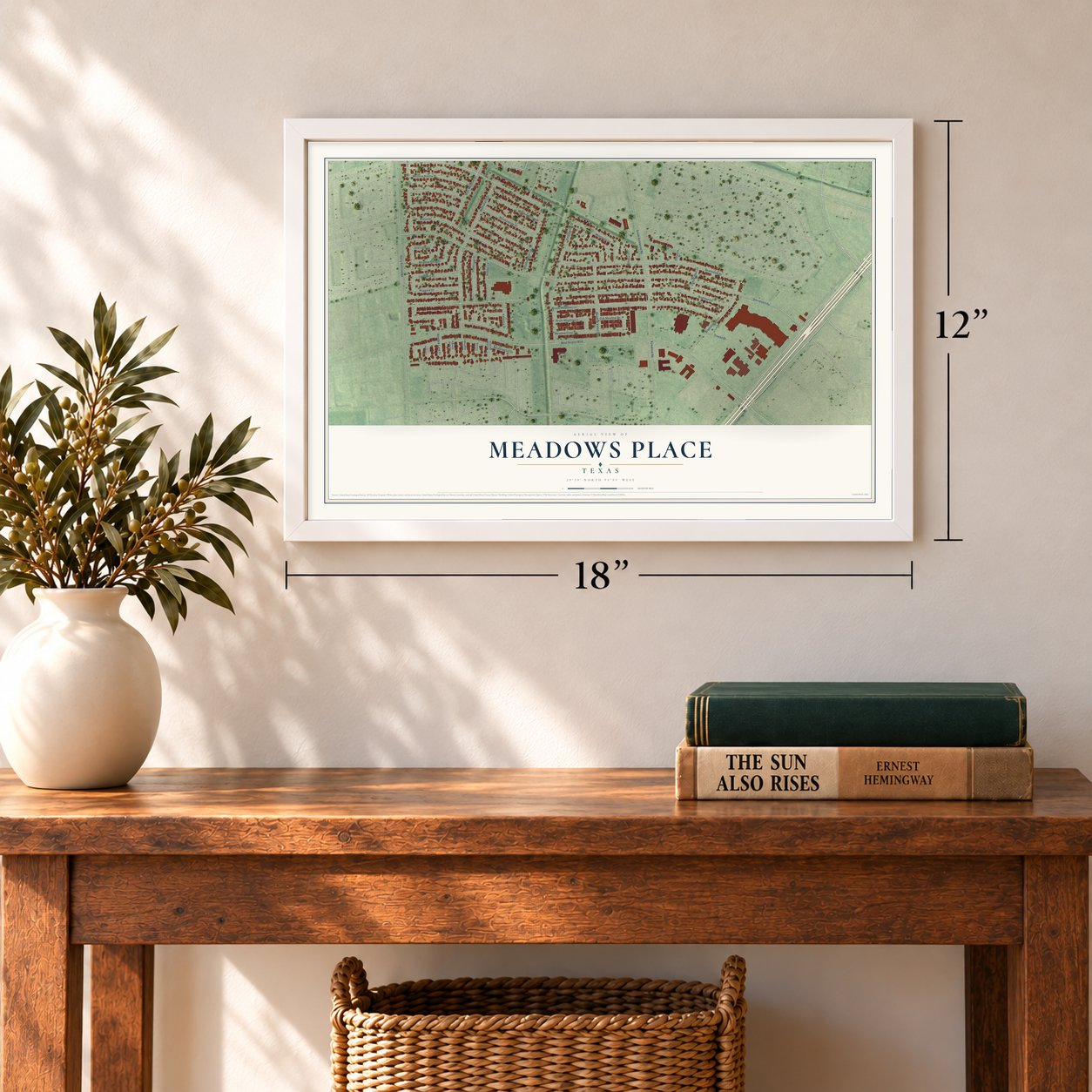 Meadows Place, Texas map, 12 x 18 inch print in a white frame in an entryway