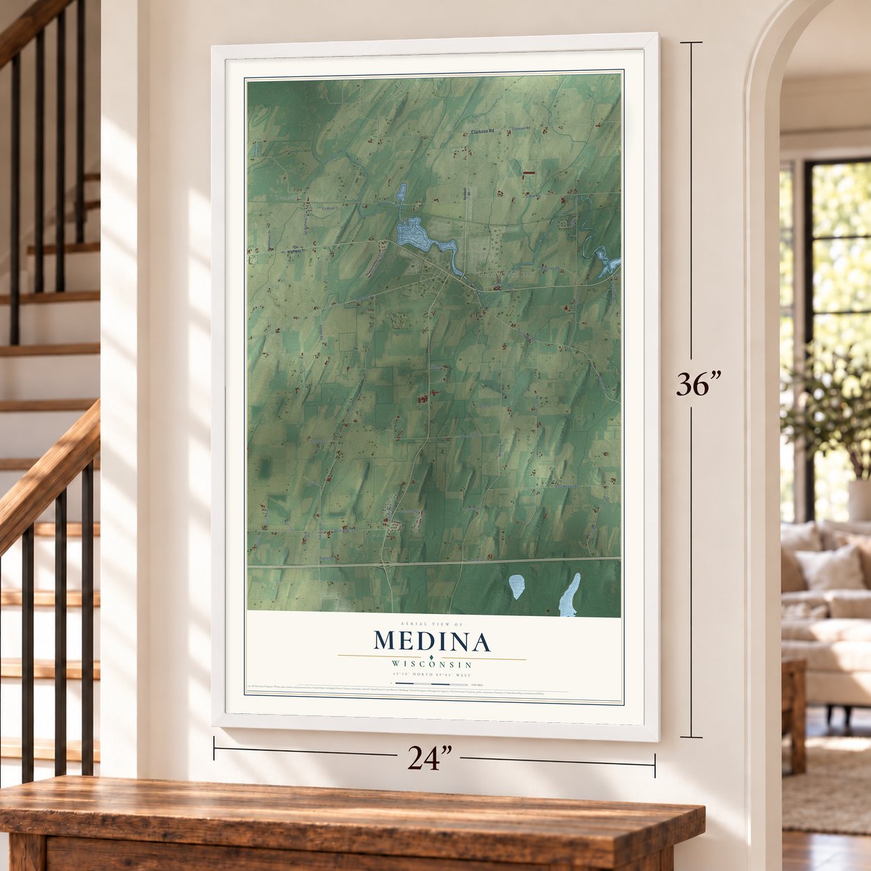 Medina, Wisconsin map, 24 x 36 inch print in a white frame by a staircase