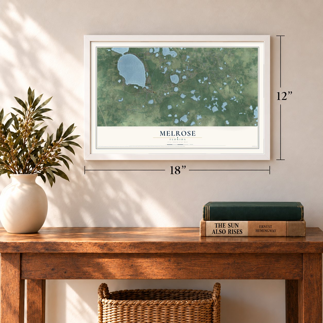 Melrose, Florida map, 12 x 18 inch print in a white frame in an entryway