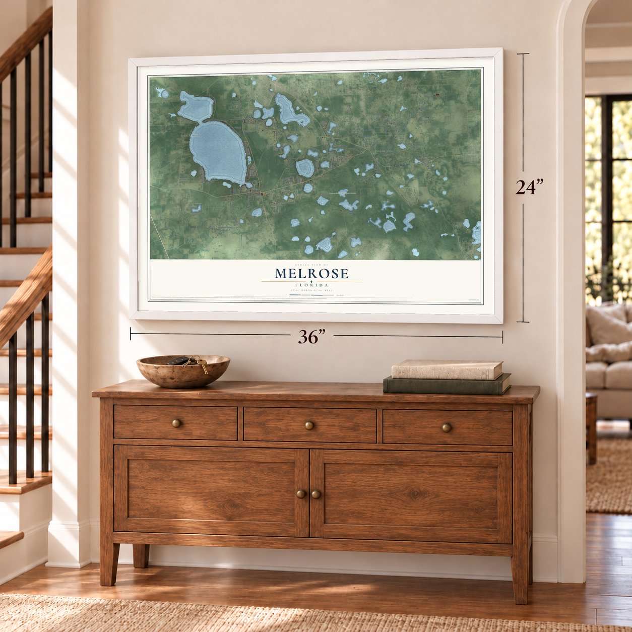 Melrose, Florida map, 24 x 36 inch print in a white frame above a dresser by a staircase