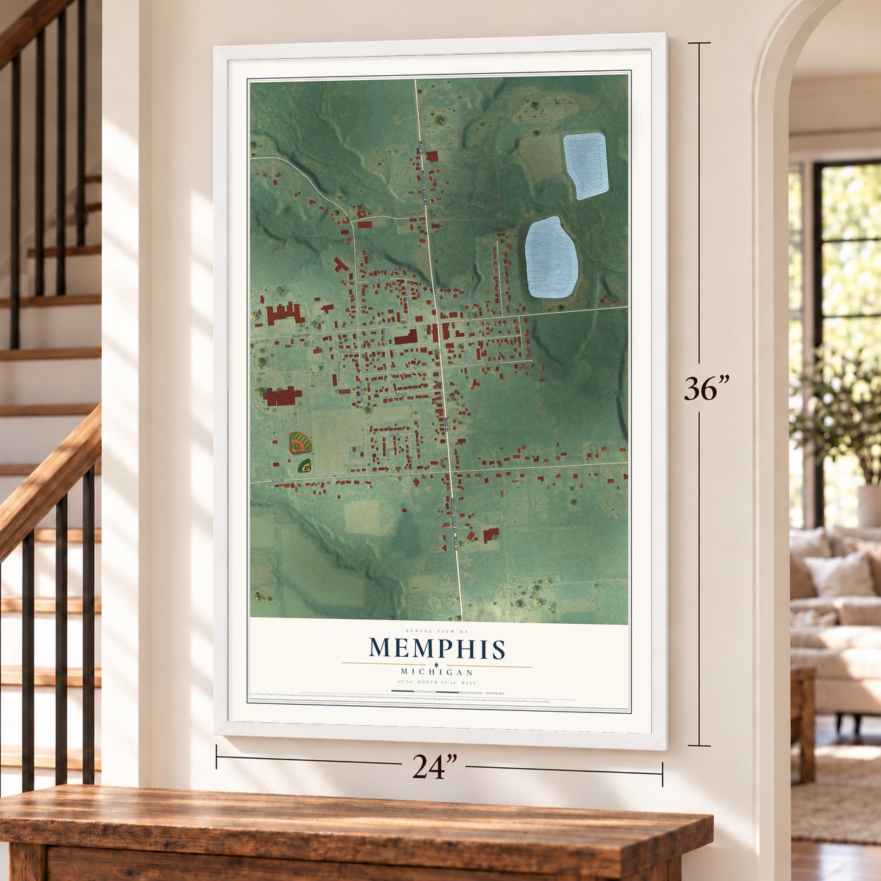 Memphis, Michigan map, 24 x 36 inch print in a white frame by a staircase