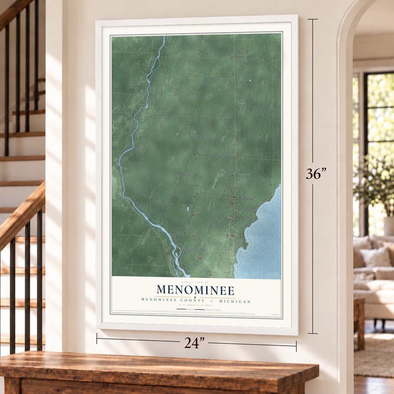 Menominee, Menominee County, Michigan map, 24 x 36 inch print in a white frame by a staircase