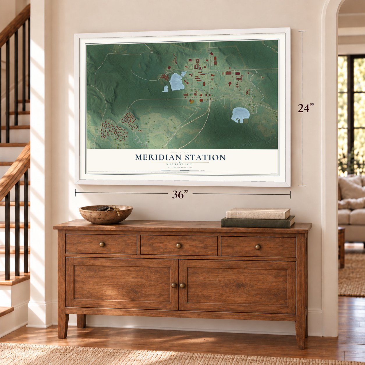 Meridian Station, Mississippi map, 24 x 36 inch print in a white frame above a dresser by a staircase