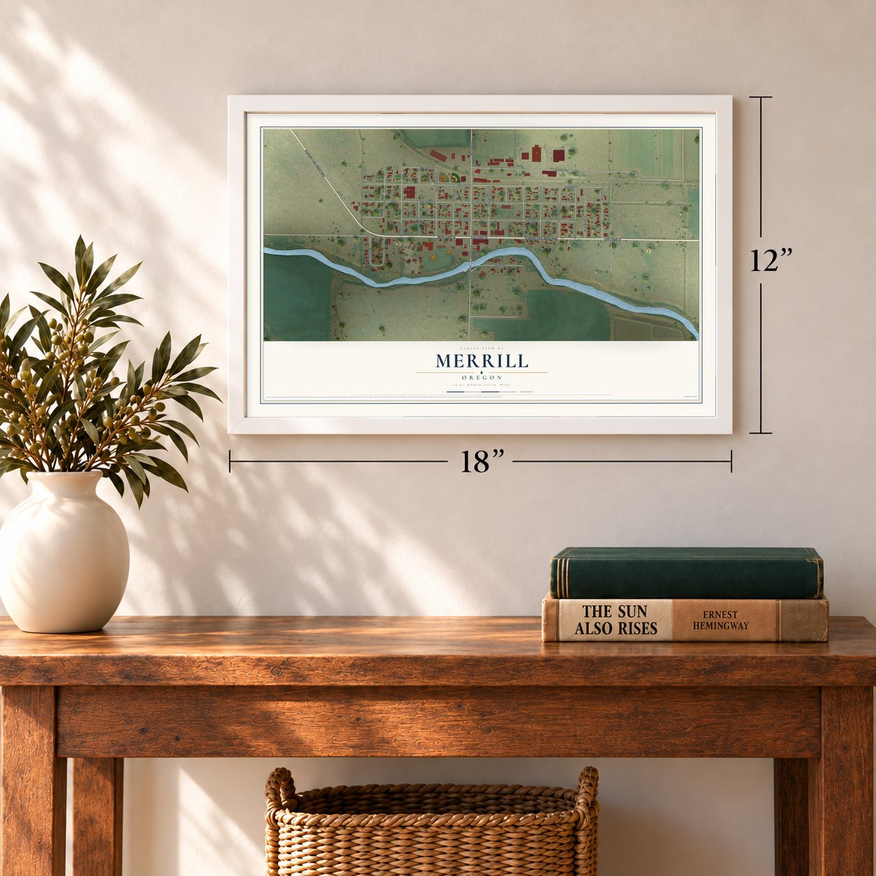 Merrill, Oregon map, 12 x 18 inch print in a white frame in an entryway