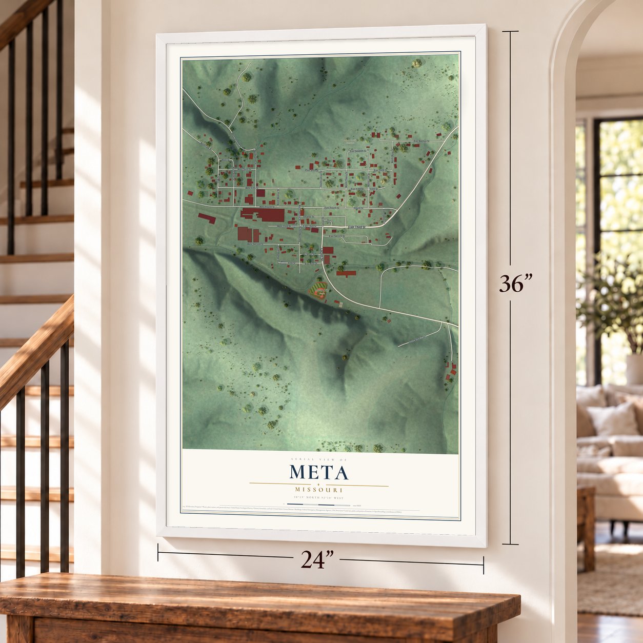 Meta, Missouri map, 24 x 36 inch print in a white frame by a staircase
