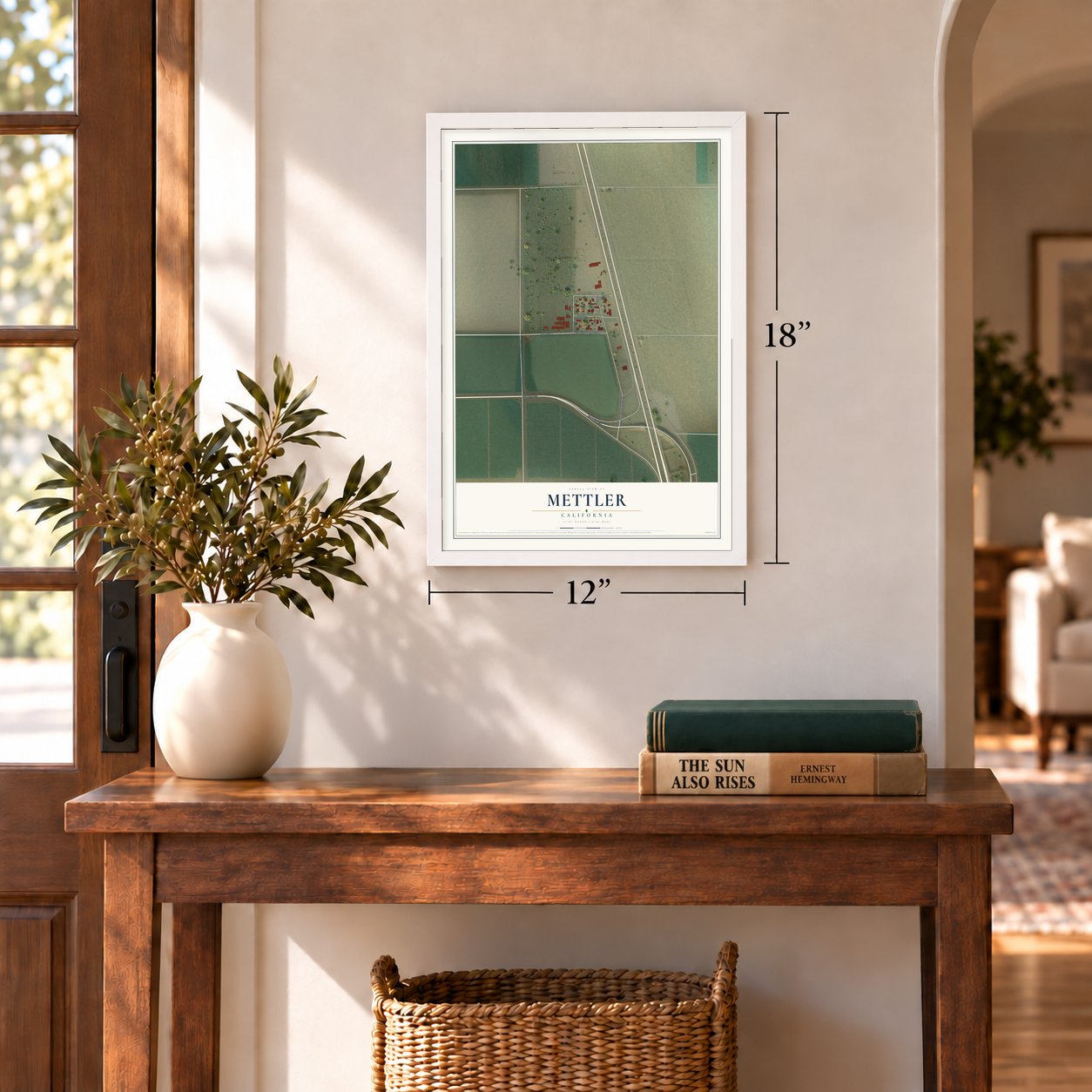 Mettler, California map, 12 x 18 inch print in a white frame in an entryway