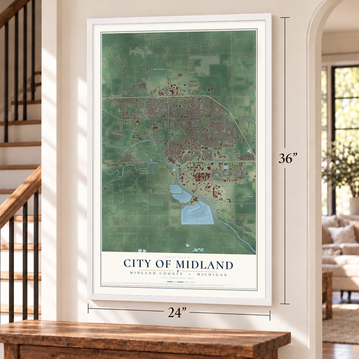Midland, Michigan map, 24 x 36 inch print in a white frame by a staircase