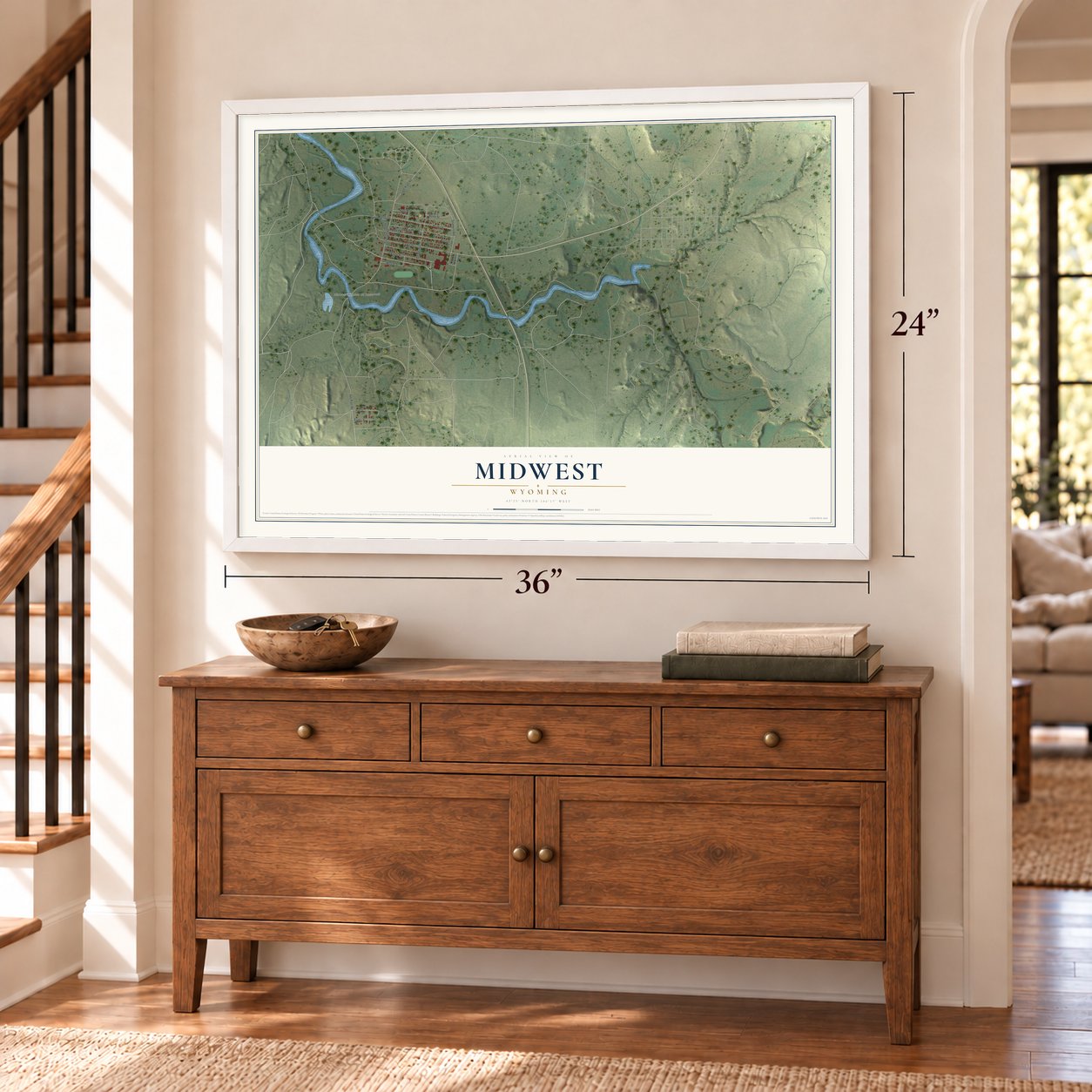 Midwest, Wyoming map, 24 x 36 inch print in a white frame above a dresser by a staircase