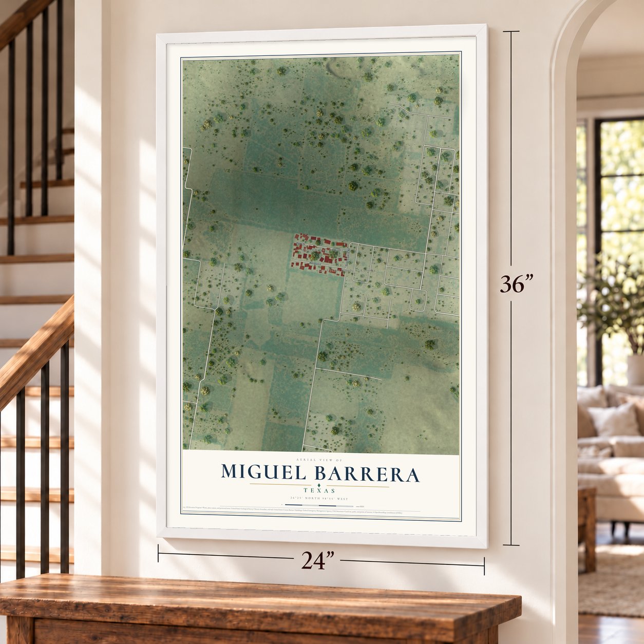 Miguel Barrera, Texas map, 24 x 36 inch print in a white frame by a staircase
