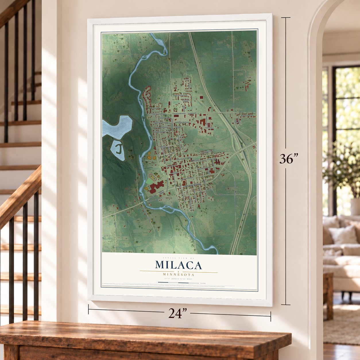 Milaca, Minnesota map, 24 x 36 inch print in a white frame by a staircase